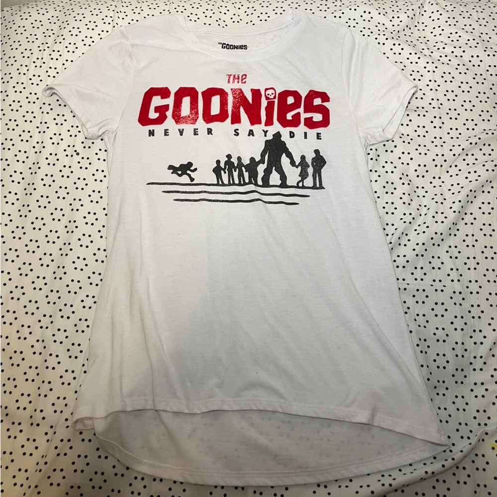 White t shirt with Goonies picture on the front.